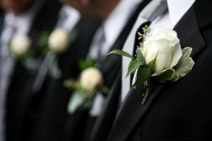Boutonnieres on black Suits of men